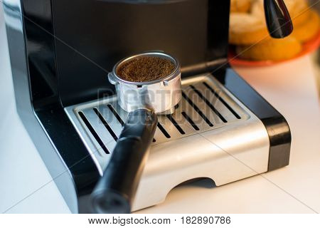 Make fresh coffee in a coffee machine