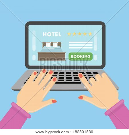 Online hotel booking. Female hands typing on the laptop to book a roomin the hotel.