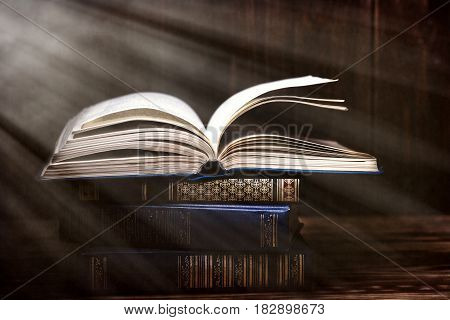 Mystical old book. Open old book indoor. A fairy tale