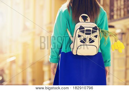 Street Fashion Concept. Portrait Of Fashionable And Beautiful Girl In Blue Coat With Cute Backpack O