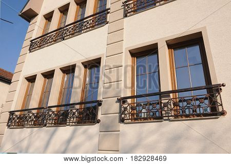 Facade of thehouse with beautiful modern plastic windows