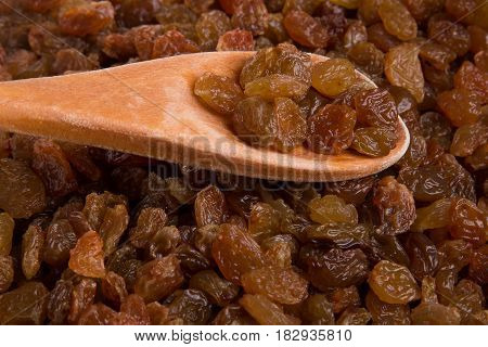 A scattering of raisins. Raisin Background. Fresh raisins.