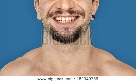 Adult man smiling studio portrait