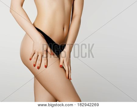 Perfect Slim Toned Young Body Of The Girl. Fitness Or Plastic Surgery And Aesthetic Cosmetology. Bea