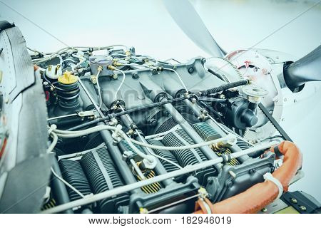 Aircraft engine detail. Piece of equipment of the aircraft engine closeup. View of an aircraft engine.