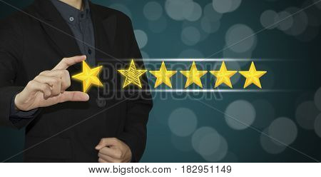 Business hand select yellow marker on five star rating. concept customer service excellent.