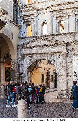 Tourists Near Of Porta Borsari In Verona City