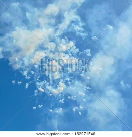 blue sky with fireworks firecrackers and smoke in day time Ischia Italy