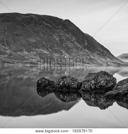 Stunning Winter Foggy Sunrise On Crummock Water In Lake District England