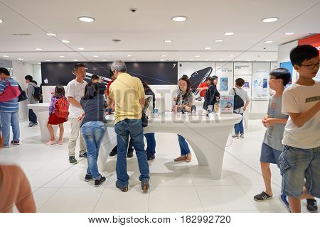 HONG KONG - CIRCA NOVEMBER, 2016: people at SmarTone shop. SmarTone Telecommunications Holdings Limited is a wireless communications carrier with operating subsidiaries in Hong Kong and Macau.