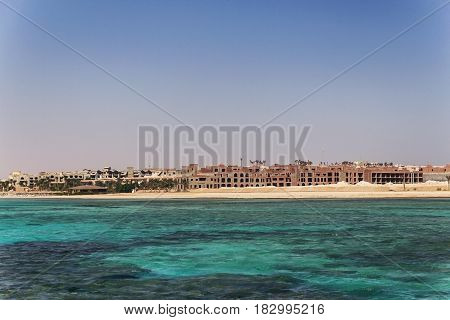 Egypt. Hurghada. Landscape From The Sea Vidneetsya Horizon Line With An Unfinished Hotel.