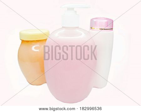 bottles of shampoo and shower gel cosmetic set