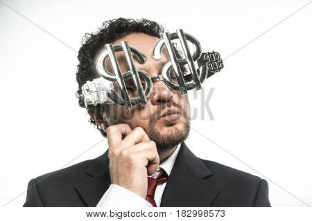 Millionare, Businessman with suit and glasses in the form of dollars. Expressions of stress, overwhelm and craving for money