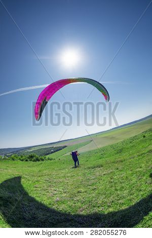 Air Paragliding Under The Sun