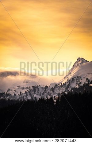 View From Small Village Hohentauern To Sunset Over Snowy Mountains Lackneralm And Schüttnerkogel On 