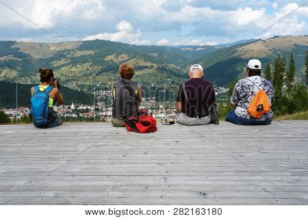 Vatra Dornei, Romania - August 20, 2016: Tourists Are Watching A Panorama Of The City Of Vatra Dorne