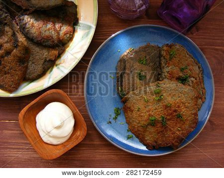Balarussian And Russian Traditional Rustic Cuisine : Draniki, Potato Pancakes On Wooden Table