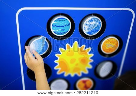 Moscow, Russia - July 6: Exhibition In Moscow Planetarium. Little Girl Looking At The Exhibits Of Th