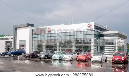 Kiev, Ukraine - September 11, 2018. Picture Of Fiat Dealer Salon With Cars Outside Of It. There Are 