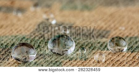 Water Droplets On Moisture Resistant Fabric Close Up