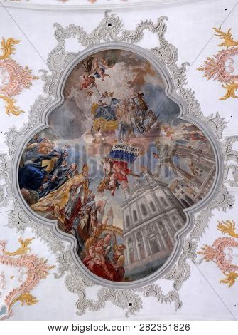 LUCERNE, SWITZERLAND - JUNE 24, 2018: Glory of Saint Francis Xavier, fresco on the ceiling of the Jesuit church of St. Francis Xavier in Lucerne, Switzerland
