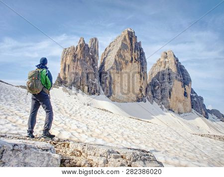 Tourist Walk Drei Zinnen Round Tour.  Tre Cime Di Lavaredo With Hiker Sextener Dolomiten Or Dolomiti