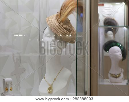ST. PETERSBURG, RUSSIA - FEBRUARY 1, 2019: People on the exhibition of Anna Mikhailova hats and jewelry made of non-traditional materials during Annual Jewelry Festival Faberge Heritage