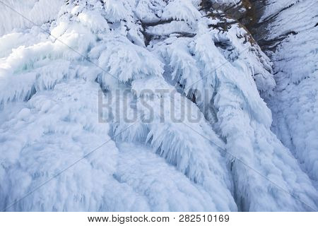 Large Icicles. Winter Frozen Nature