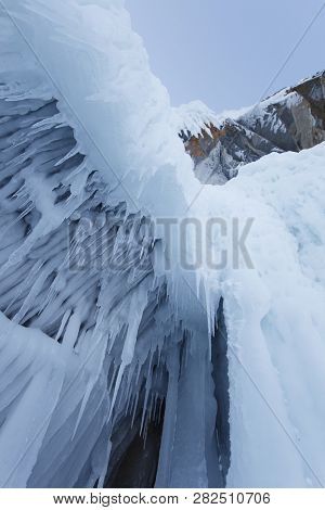 Large Icicles. Winter Frozen Nature