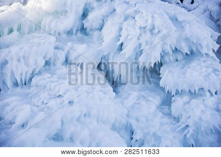 Large Icicles. Winter Frozen Nature