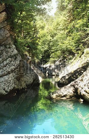Wet Canyon Of River Psakho. Mountain River With Blue Water. Sochi, Russia.