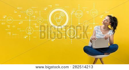 Lifi Theme With Young Woman Using A Laptop Computer