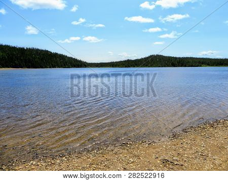 The Pristine Clear Waters Of Sandy Pond In Terra Nova National Park, Newfoundland And Labrador, Cana