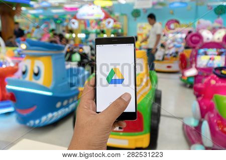 Chiang Mai, Thailand - Jan. 06,2019: Man Holding Huawei With Dropbox On Screen. Dropbox Is A Service