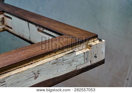 Wood Door Manufacturing Process. Door Frame, Painted In Dark Color. Furniture Manufacture.