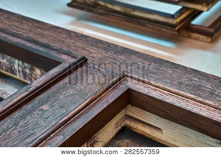 Wood Door Manufacturing Process. Door Frame, Painted In Dark Color. Furniture Manufacture.