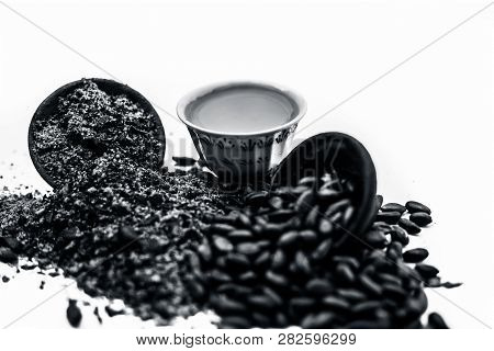 Close Up Of Paste Of Custard Apple Seeds In A Glass Bowl With Some Powdered Seeds And Raw Dried Seed