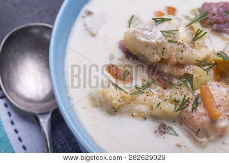 Sea Food Chalder Soup In Cup With Spoon
