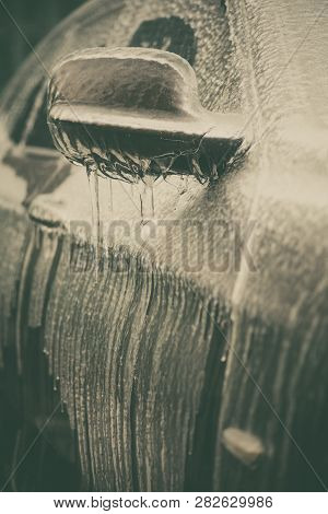 Close Up Shot Of A Frozen Car Mirror After Freezing Rain.