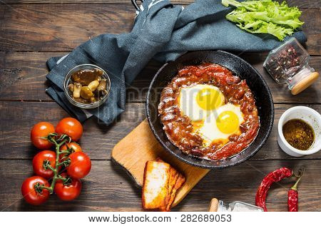 Shakshuka, Fried Eggs In Tomato Sauce In Iron Frying Pan. Israel Food.