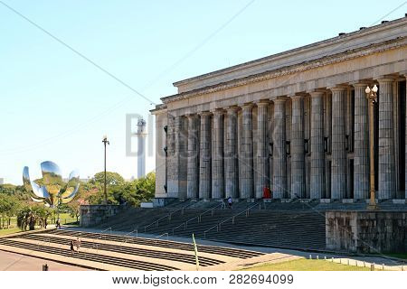 Neoclassical Building Of University Of Buenos Aires Faculty Of Law With Famous Steel Flower Floralis