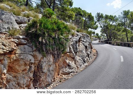 Open Coastal Road Winding Through To Lighthouse Cap Formentor