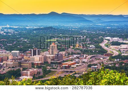 Roanoke, Virginia, USA downtown skyline from above at dusk. 
