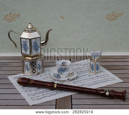 English Teacup And Saucer, Silver-plated Teapot On A Silver Stove, Spoon Vase And Teaspoon, With Flo