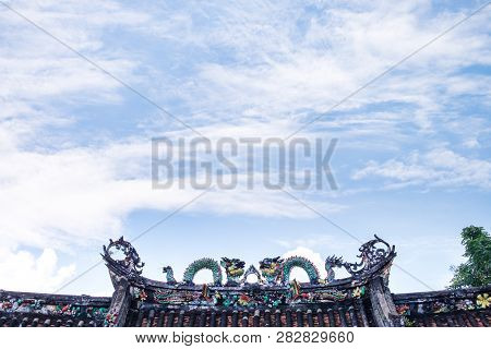 Ornamental Dragon Statue Are Located On The Roof