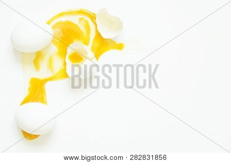Eggs.  Eggs Fresh, Unharmed And One Broken Egg With Yellow Yolk On A White Background. Healthy Eatin