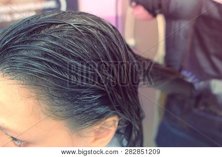 Application Of Keratin To The Hair With A Brush. Strengthening The Hair With Keratin.