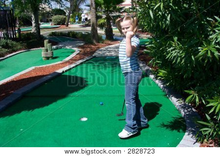 Niña golfista