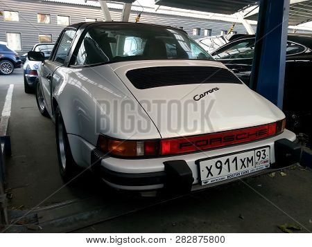 Moscow. Autumn 2018. Blue Classic Porsche 911 Targa On Parking. 964 Convertible Parked
