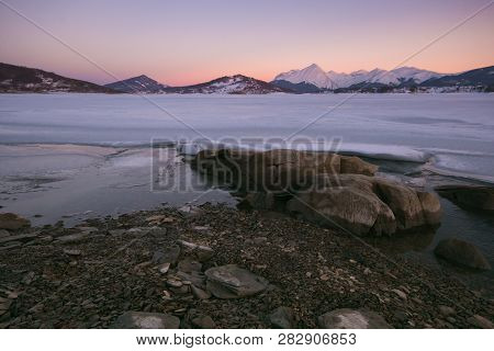 Magic View Of Gran Sasso E Monti Della Laga National Park. Campotosto Lake At Sunset